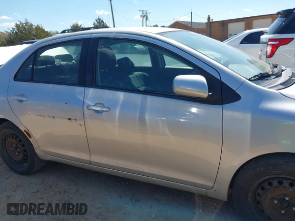 2010 Toyota Yaris with VIN JTDBT4K35A1359371, listed as a IAAI auction lot 41870593 with 207,616 mi miles. Bid and sale history available at carsss.com. Image 13.