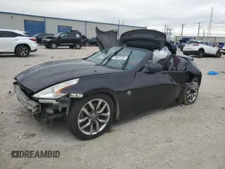 2014 Nissan 370Z Touring with VIN JN1AZ4FHXEM620145, listed as a Copart auction lot 79667724 with Not Provided miles and Salvage Title. Bid and sale history available at DreamBid. Image 1.