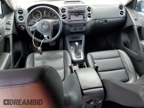 2014 Volkswagen Tiguan SE with VIN WVGAV3AXXEW543245, listed as a Copart auction lot 42288905 with 92,851 mi miles and Salvage title. Bid and sale history available at DreamBid. Image 8.