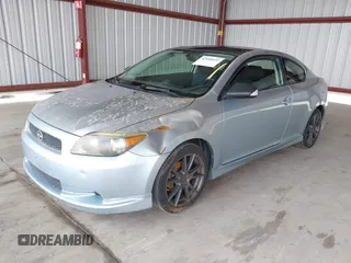 2007 Scion tC Spec with VIN JTKDE177270163067, listed as a IAAI auction lot 42058453 with 265,531 mi miles. Bid and sale history available at carsss.com. Image 2.
