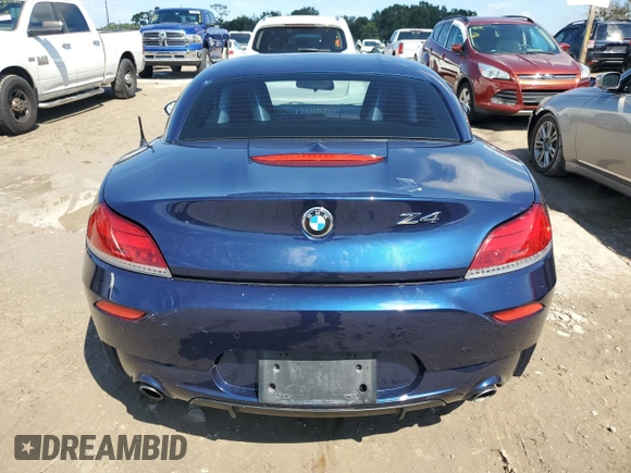 2011 BMW Z4 sDrive35is with VIN WBALM1C56BE393858, listed as a Copart auction lot 74249954 with Not provided miles and Salvage title. Bid and sale history available at DreamBid. Image 6.