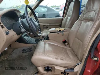 1999 Mercury Mountaineer z VIN 4M2DU55P5XUJ16364, wystawiony jako Copart lot #57493435 z przebiegiem 166 256 mil mil oraz Tytuł czysty. Historia ofert i sprzedaży dostępna na DreamBid. Obrazek 7.