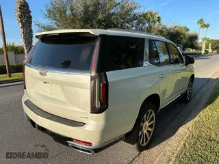 2022 Cadillac Escalade Premium Luxury Platinum with VIN 1GYS4DKL2NR201150, listed as a Copart auction lot 77114414 with 24,719 mi miles and Clean Title. Bid and sale history available at carsss.com. Image 4.