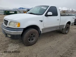 2001 Ford F-150 XL z VIN 1FTRF18W61NB50414, wystawiony jako Copart lot #82256794 z przebiegiem 173 301 mil mil oraz Czysty tytuł • Clean title. Historia ofert i sprzedaży dostępna na DreamBid. Obrazek 1.
