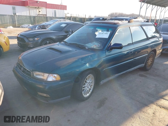 1998 Subaru Legacy GT with VIN 4S3BK6757W6306738, listed as a IAAI auction lot 41267382 with 291,068 mi miles and . Bid and sale history available at DreamBid. Image 2.