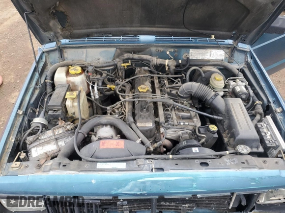 1996 Jeep Cherokee Sport with VIN 1J4FJ68S3TL251074, listed as a Copart auction lot 59593955 with 181,482 mi miles and Salvage title. Bid and sale history available at DreamBid. Image 12.