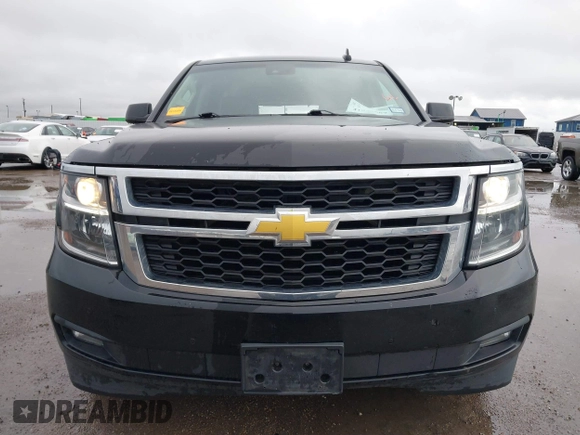 2015 Chevrolet Tahoe LT with VIN 1GNSCBKC2FR632139, listed as a IAAI auction lot 41553087 with 142,775 mi miles and . Bid and sale history available at DreamBid. Image 12.