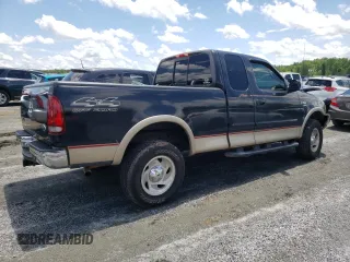 2000 Ford F-150 XL z VIN 1FTRX18L7YNB44005, wystawiony jako Copart lot #56535195 z przebiegiem 187 429 mil mil oraz Szkoda całkowita • Salvage title. Historia ofert i sprzedaży dostępna na DreamBid. Obrazek 3.