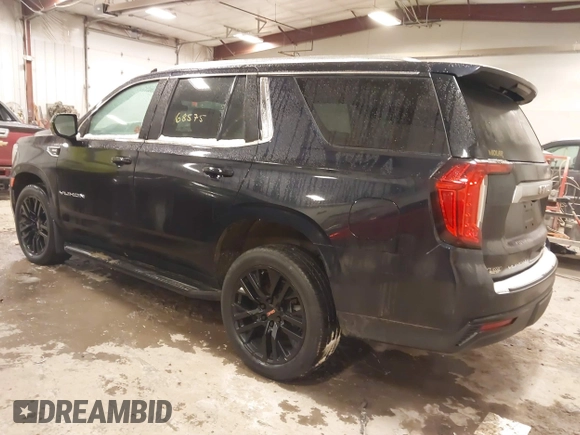 2021 GMC Yukon SLE with VIN 1GKS2AKD5MR404460, listed as a IAAI auction lot 41468575 with 49,917 mi miles. Bid and sale history available at carsss.com. Image 3.