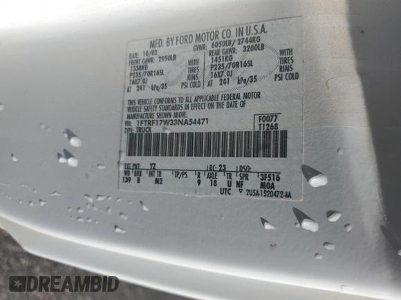 2003 Ford F-150 XL with VIN 1FTRF17W33NA54471, listed as a Copart auction lot 42594765 with 134,409 mi miles and Salvage Title. Bid and sale history available at DreamBid. Image 12.