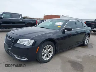 2016 Chrysler 300 Limited with VIN 2C3CCAAG7GH219523, listed as a IAAI auction lot 41932271 with 158,082 mi miles. Bid and sale history available at carsss.com. Image 2.