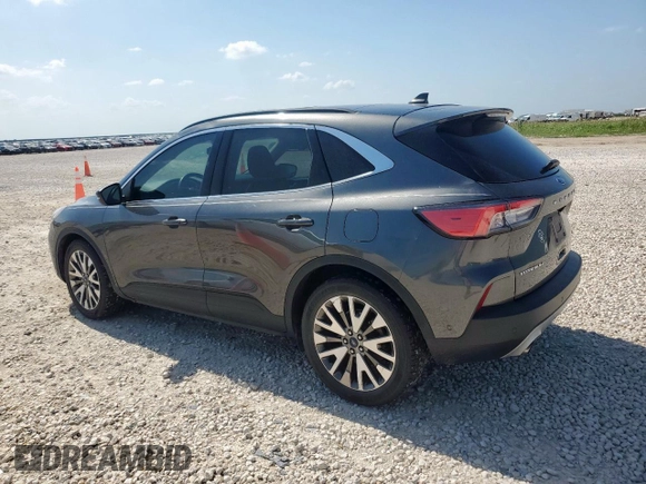 2020 Ford Escape Titanium Hybrid z VIN 1FMCU0DZ1LUC38345, wystawiony jako Copart lot #59628985 z przebiegiem 86 917 mil mil oraz Szkoda całkowita • Salvage title. Historia ofert i sprzedaży dostępna na DreamBid. Obrazek 2.