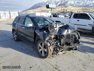 2014 Jeep Grand Cherokee Overland with VIN 1C4RJFCM5EC417335, listed as a Copart auction lot 87300714 with 0 mi miles and Salvage Title. Bid and sale history available at carsss.com. Image 4.
