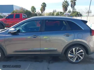2017 Kia Niro Touring with VIN KNDCE3LC0H5051499, listed as a IAAI auction lot 41550176 with 82,592 mi miles. Bid and sale history available at carsss.com. Image 15.