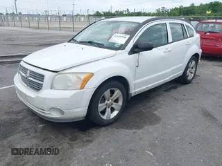 2011 Dodge Caliber Mainstreet with VIN 1B3CB3HA0BD157191, listed as a IAAI auction lot 42128580 with 185,474 mi miles. Bid and sale history available at carsss.com. Image 2.