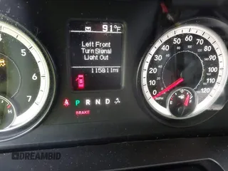 2014 Ram 1500 Express with VIN 1C6RR6KT1ES389144, listed as a IAAI auction lot 42405912 with 115,811 mi miles and . Bid and sale history available at DreamBid. Image 7.