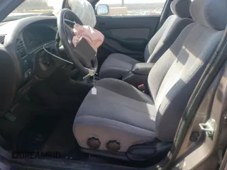 1994 Toyota Camry LE z VIN JT2GK12E2R0050878, wystawiony jako Copart lot #46878005 z przebiegiem 152 211 mil mil oraz Szkoda całkowita • Salvage title. Historia ofert i sprzedaży dostępna na DreamBid. Obrazek 7.