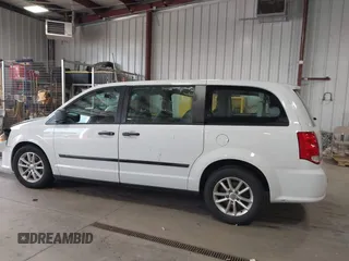 2014 Dodge Grand Caravan American Value with VIN 2C4RDGBG7ER345277, listed as a IAAI auction lot 42061355 with 145,889 mi miles and . Bid and sale history available at DreamBid. Image 14.