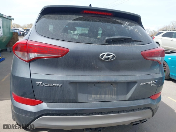 2018 Hyundai Tucson Value with VIN KM8J3CA24JU646807, listed as a IAAI auction lot 41960629 with 117,646 mi miles. Bid and sale history available at carsss.com. Image 16.