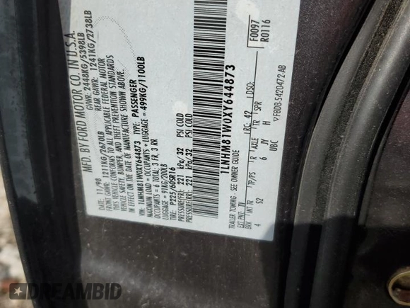 1999 Lincoln Town Car Executive z VIN 1LNHM81W0XY644873, wystawiony jako Copart lot #52865095 z przebiegiem Nie podano mil oraz Szkoda całkowita • Salvage title. Historia ofert i sprzedaży dostępna na DreamBid. Obrazek 12.