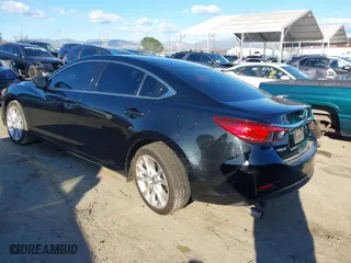 2017 Mazda Mazda6 Touring with VIN JM1GL1V56H1118933, listed as a IAAI auction lot 41759801 with 112,668 mi miles. Bid and sale history available at carsss.com. Image 3.