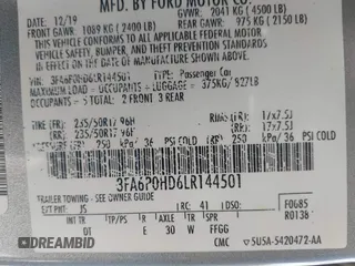 2020 Ford Fusion SE z VIN 3FA6P0HD6LR144501, wystawiony jako IAAI lot #42715066 z przebiegiem 204 983 mil mil oraz . Historia ofert i sprzedaży dostępna na DreamBid. Obrazek 9.