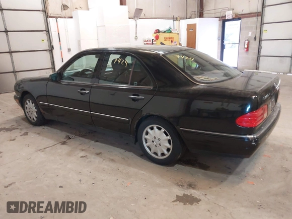 1998 Mercedes-Benz E-Class with VIN WDBJF65F7WA617755, listed as a IAAI auction lot 41737424 with 113,068 mi miles. Bid and sale history available at carsss.com. Image 3.