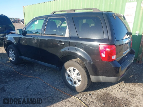 2010 Mazda Tribute Sport with VIN 4F2CY9C74AKM03679, listed as a IAAI auction lot 41740156 with 142,208 mi miles and . Bid and sale history available at DreamBid. Image 3.