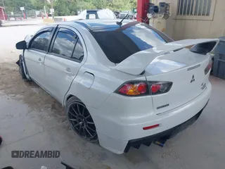 2015 Mitsubishi Lancer Evolution Final Edition with VIN JA32W7FVXFU027564, listed as a IAAI auction lot 41941191 with 52,235 mi miles. Bid and sale history available at carsss.com. Image 3.
