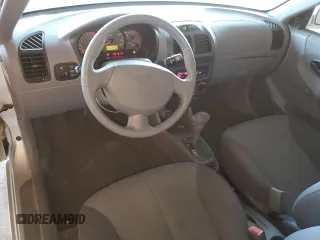 2004 Hyundai Accent GL with VIN KMHCG35CX4U283952, listed as a Copart auction lot 73587124 with 41,742 mi miles and Salvage Title. Bid and sale history available at carsss.com. Image 8.