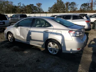 2010 Lexus HS 250h with VIN JTHBB1BA6A2008347, listed as a Copart auction lot 77246944 with 151,082 mi miles and Salvage Title. Bid and sale history available at DreamBid. Image 2.