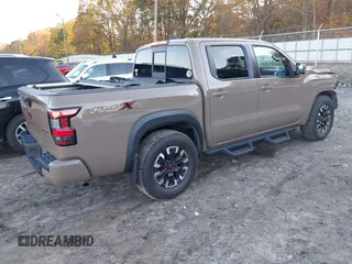 2022 Nissan Frontier SV z VIN 1N6ED1EJ3NN648912, wystawiony jako IAAI lot #40888927 z przebiegiem 59 633 mil mil oraz . Historia ofert i sprzedaży dostępna na DreamBid. Obrazek 4.