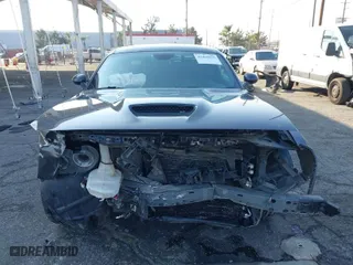 2021 Dodge Challenger GT with VIN 2C3CDZKG4MH677574, listed as a IAAI auction lot 41460036 with 67,170 mi miles. Bid and sale history available at carsss.com. Image 6.