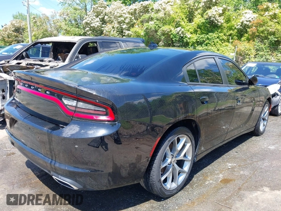 2022 Dodge Charger SXT with VIN 2C3CDXBG2NH243580, listed as a IAAI auction lot 41624754 with 38,002 mi miles and . Bid and sale history available at carsss.com. Image 4.