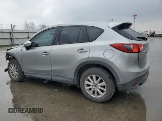 2015 Mazda CX-5 Touring with VIN JM3KE2CY4F0469096, listed as a Copart auction lot 48075105 with 131,788 mi miles and Salvage Title. Bid and sale history available at carsss.com. Image 2.
