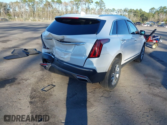2021 Cadillac XT5 AWD Premium Luxury with VIN 1GYKNDRS3MZ115273, listed as a IAAI auction lot 41228531 with 46,556 mi miles. Bid and sale history available at carsss.com. Image 4.