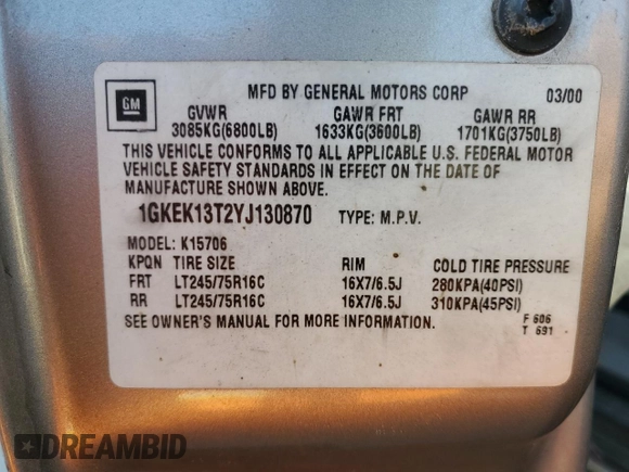 2000 GMC Yukon SLE with VIN 1GKEK13T2YJ130870, listed as a Copart auction lot 82887054 with 310,765 mi miles and Salvage Title. Bid and sale history available at carsss.com. Image 13.