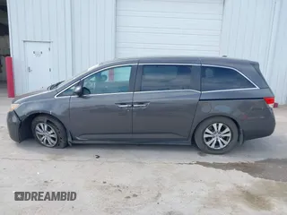 2014 Honda Odyssey EX-L with VIN 5FNRL5H67EB106183, listed as a IAAI auction lot 42210600 with 196,166 mi miles and . Bid and sale history available at DreamBid. Image 14.