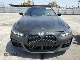 2022 BMW 4 Series M440i with VIN WBA53AT01NCJ52404, listed as a Copart auction lot 54464474 with 16,880 mi miles and Salvage title. Bid and sale history available at DreamBid. Image 5.