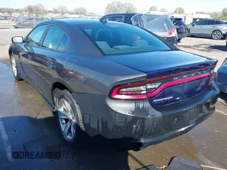 2018 Dodge Charger SXT Plus with VIN 2C3CDXHG9JH162934, listed as a IAAI auction lot 41849996 with 112,832 mi miles and . Bid and sale history available at carsss.com. Image 3.