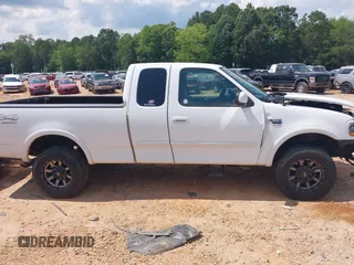 1999 Ford F-150 XL with VIN 1FTRX18L5XNA50607, listed as a IAAI auction lot 42626517 with Not provided miles and . Bid and sale history available at DreamBid. Image 13.