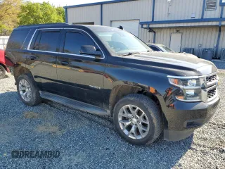 2015 Chevrolet Tahoe LT with VIN 1GNSCBKC0FR521749, listed as a Copart auction lot 50480075 with 156,940 mi miles and Salvage Title. Bid and sale history available at DreamBid. Image 4.