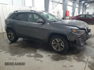 2019 Jeep Cherokee Trailhawk with VIN 1C4PJMBXXKD362555, listed as a Copart auction lot 88888565 with 120,673 mi miles and Salvage Title. Bid and sale history available at DreamBid. Image 4.