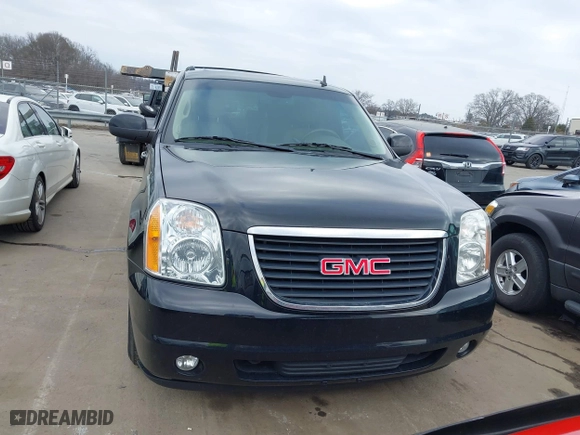 2013 GMC Yukon XL SLT with VIN 1GKS1KE00DR332987, listed as a IAAI auction lot 41512378 with 190,693 mi miles. Bid and sale history available at carsss.com. Image 12.