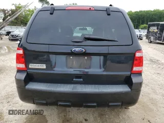 2012 Ford Escape XLS with VIN 1FMCU9C71CKA30319, listed as a Copart auction lot 60189745 with 214,736 mi miles and Salvage title. Bid and sale history available at DreamBid. Image 6.