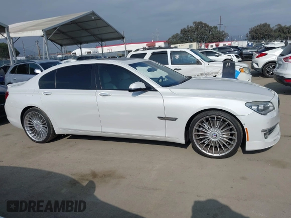 2015 BMW 7 Series 750Li with VIN WBAYE8C52FD785162, listed as a IAAI auction lot 42121389 with 88,783 mi miles and . Bid and sale history available at DreamBid. Image 13.