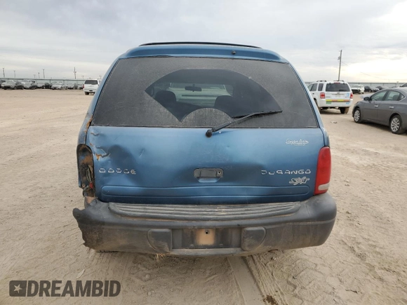 2003 Dodge Durango Sport with VIN 1D4HR38N53F619322, listed as a Copart auction lot 84671004 with 167,511 mi miles and Salvage title. Bid and sale history available at DreamBid. Image 6.