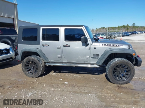 2015 Jeep Wrangler Unlimited Rubicon Hard Rock with VIN 1C4HJWFG2FL587607, listed as a IAAI auction lot 41419237 with 109,719 mi miles and . Bid and sale history available at DreamBid. Image 13.