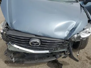 2016 Mazda CX-5 Touring with VIN JM3KE4CY9G0647226, listed as a Copart auction lot 51566405 with 77,785 mi miles and Salvage Title. Bid and sale history available at carsss.com. Image 13.
