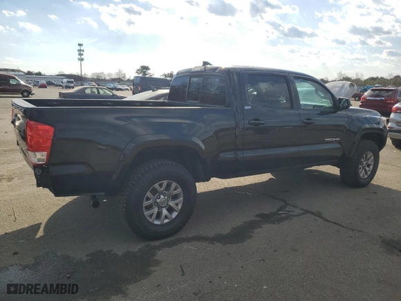 2016 Toyota Tacoma SR5 with VIN 3TMDZ5BN2GM002949, listed as a Copart auction lot 43263985 with 136,748 mi miles and Salvage Title. Bid and sale history available at carsss.com. Image 3.